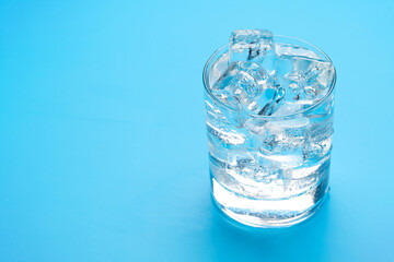 Glass of water with ice cubes