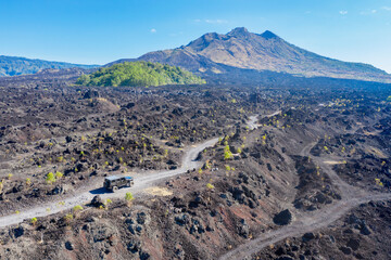 Off road vehicle fording solidified lava flows