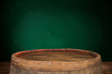 Fototapeta premium Old wooden barrel on a brown background