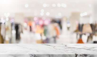 Empty white marble stone table top and blur glass window interior shopping mall banner mock up abstract background - can used for display or montage your products.