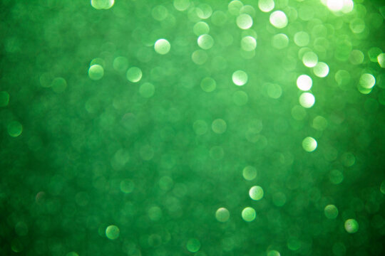 green christmas abstract background with bokeh defocused lights