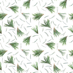 Pine branches and pine needles isolated on white background, seamless pattern. Christmas and New Year background.
