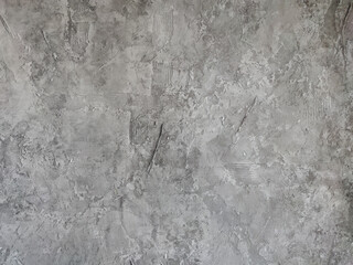 Gray textured wall for creativity. Plaster, background.