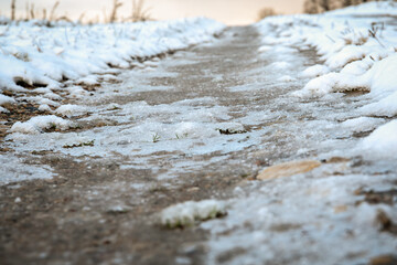 Snowy and icy road. Security and weather. Winter and cold