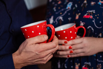 Cup of tea in hands close up