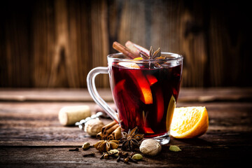 Mulled wine, hot warming drink with spices - 394593762