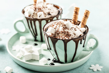 Hot chocolate or eggnog. Festive dessert with whipped cream or ice cream and chocolate