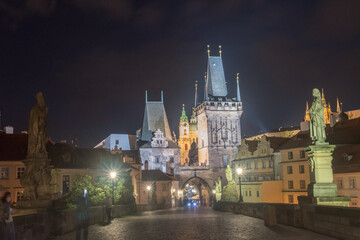 Fototapeta na wymiar Night view of Charles Bridge Towers at Mala Strana (Lesser Town) at Prague, Czech Republic.