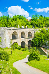 Fototapeta na wymiar Beautiful old bridge with arches in Tounj on Tounjcica river, Croatia