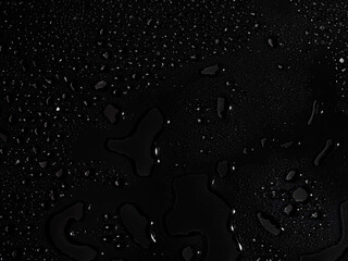 Water drops on black background