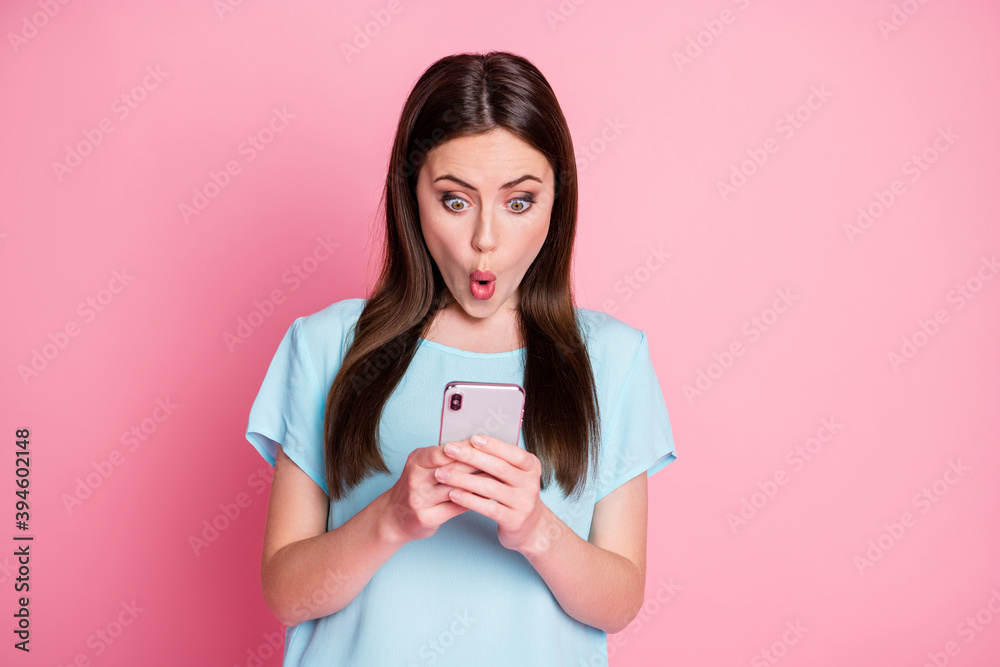 Sticker portrait of astonished girl use smart phone impressed information isolated pastel color background