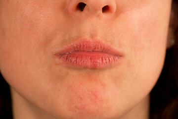 Closeup of kissing woman lips, front view