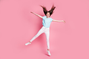 Full length photo of amazed girl jump wear good look mood clothes isolated over pink color background