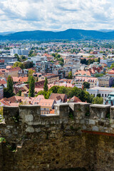 Fototapeta na wymiar Scenic view from the Ljubljana Castle over the old city center on sunny day in late summer with clouds