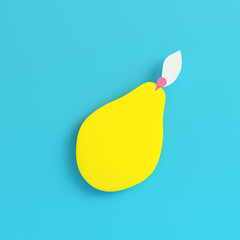 Yellow pear on bright blue background in pastel colors