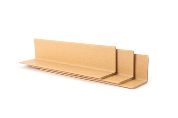 Cardboard edge protectors isolated on white - corner-edge protection while transportation goods....