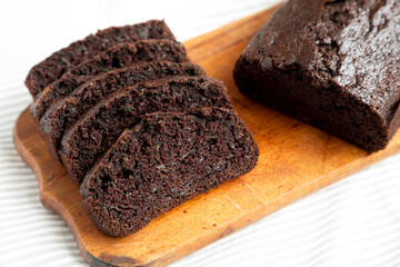 Homemade Chocolate Zucchini Bread on a rustic wooden board, low angle view. Close-up.