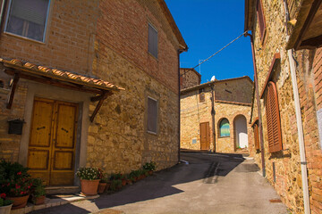 Fototapeta na wymiar Residential buildings in the historic medieval village of Vescovado di Murlo in Siena Province, Tuscany, Italy 