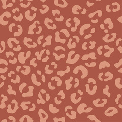 Leopard seamless pattern. Vector animal print. Black and bright pink spots on a pink background. Jaguar, leopard, cheetah, panther fur. Leopard skin imitation can be painted on clothes or fabric.