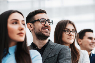 close up. young business woman standing with her colleagues