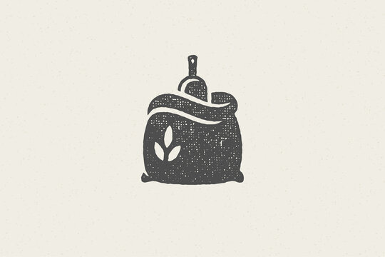 Silhouette sack of wheat flour with scoop designed for grain farm industry hand drawn stamp effect vector illustration.
