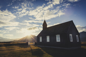 Budakirkja, black church in Iceland in sunset
