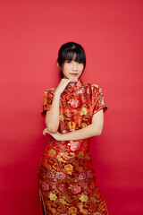 Asian woman wear Chinese dress with action