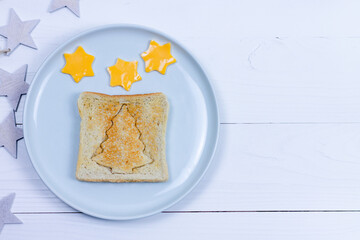 Christmas food. Toast in the shape of a Christmas tree