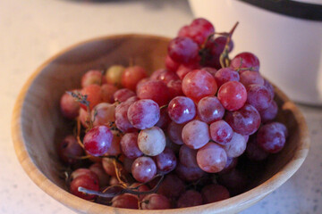 Bunch of grapes on a bamboo plate