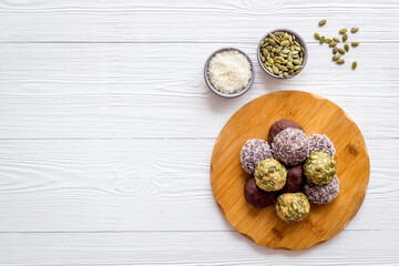 Energy protein balls with ingredients, top view