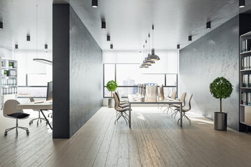 Coworking office in a loft style interior with computers