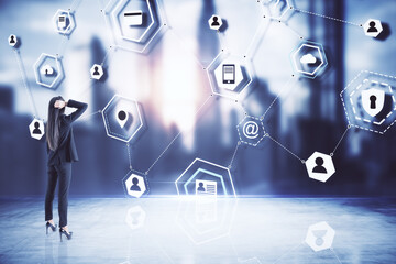 Businesswoman looking on digital computer cloud diagram.
