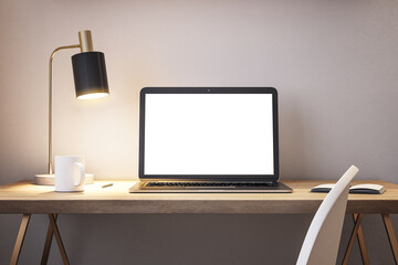 Clean interior with laptop on table