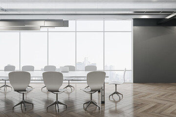 Modern conference interior with laptop on table