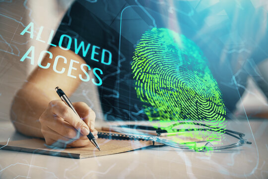 Blue fingerprint hologram over woman's hands taking notes background. Concept of protection. Double exposure