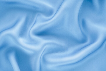 Elegant light blue silk background.
