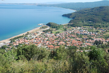 Fototapeta na wymiar a small town on the coast surrounded by forest