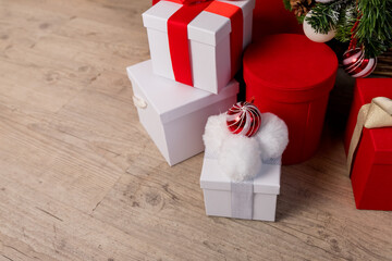 Christmas gift boxes and shopping package under Chrismas tree.New year present paper package. gift...