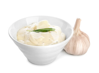 Bowl with garlic sauce on white background