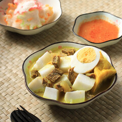 Lontong Kari Sapi, Ketupat with Beef Curry Soup. This is a Traditional Food, typically of Bandung, Indonesia.