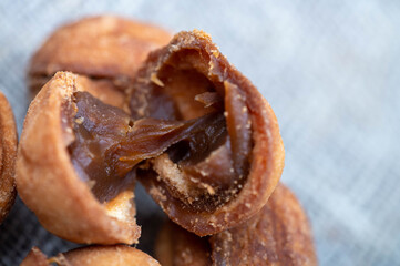 Delicious homemade cookies on the background of rough homespun fabric. Close-up, selective focus.