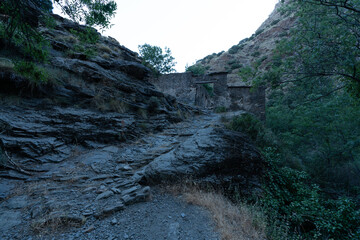 I walk towards some ancient ruins of a flour mill