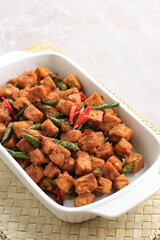 Tempe Orek or Stir Fried Tempeh, Indonesian Traditional Cuisine Made from Tempeh with Soy Sauce or Palm Sugar Added. Sometimes Add Chilli to make It Spicy