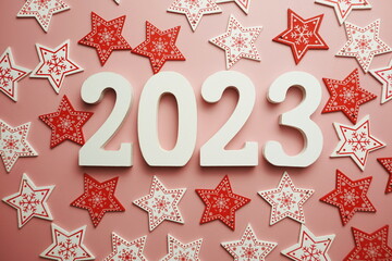 Happy New Year 2023 alphabet letter with Christmas decoration on pink background