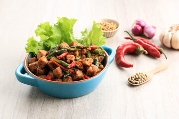 Tempe Orek or Stir Fried Tempeh, Indonesian Traditional Cuisine Made from Tempeh with Soy Sauce or Palm Sugar Added. Sometimes Add Chilli to make It Spicy