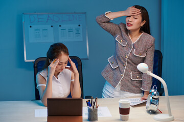 Project manager making face palm gesture after realizing that ui designer did everything wrong
