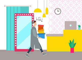 Young handsome shopper is singing and holding colorful boxes in his hands. Sale advertising concept. Male character with headphones is going to the store. Man shopping in the fashion boutique
