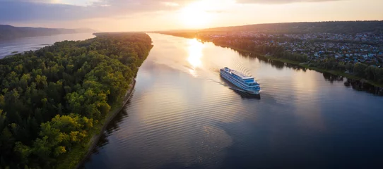 Fotobehang Panorama of the cruise ship moving on the river of Volga towards Samara city in Russia © Dudarev Mikhail