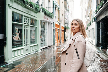 Young Female Lifestyle Blogger posing in street in Central London
