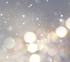 Christmas glowing Background. New year abstract glittering blurred backdrop with blinking stars and...